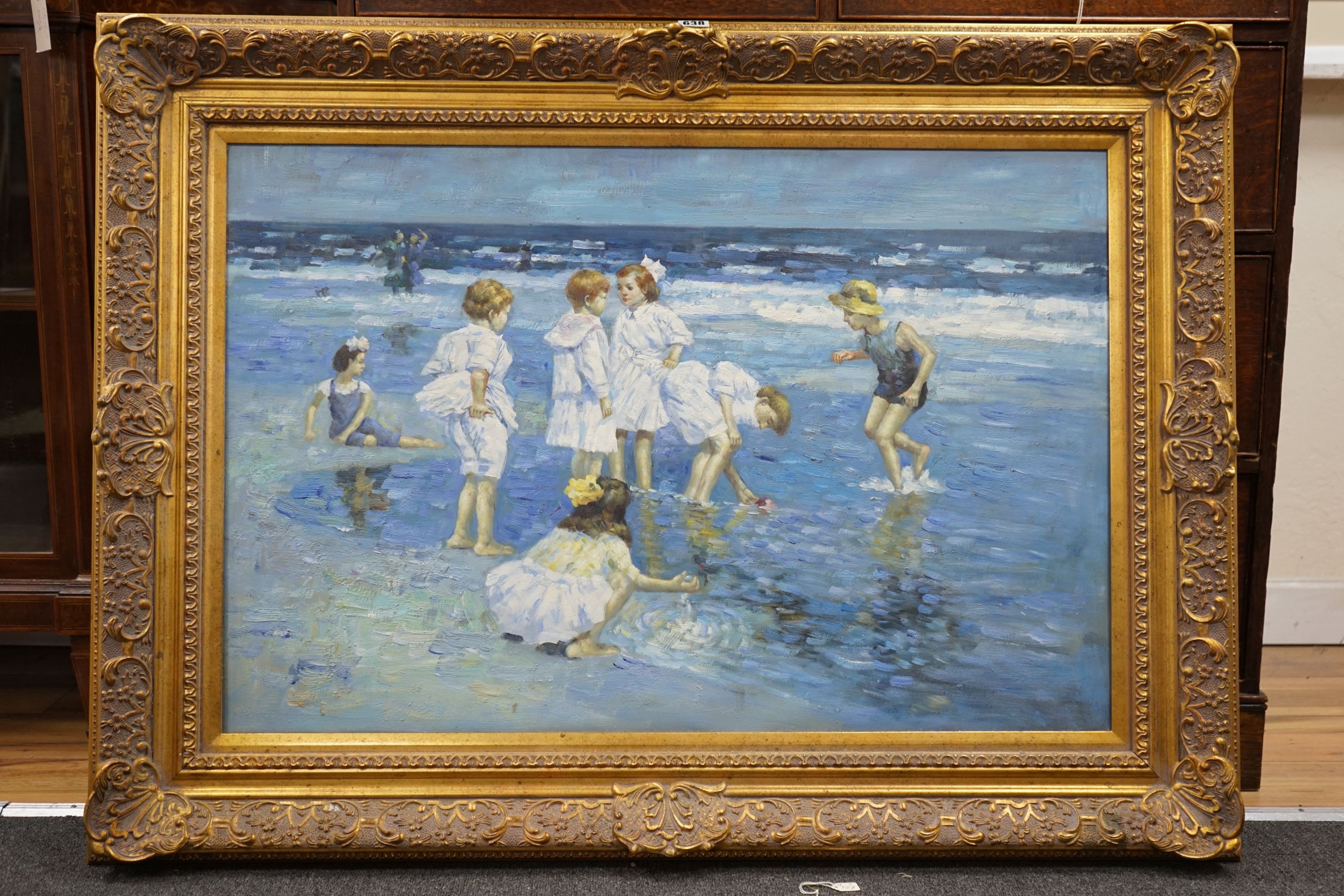 After Edward Henry Potthast (1857-1927), oil on canvas, Children on the beach, 60 x 90cm